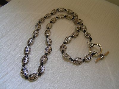 Estate Handknotted Etched Leaf Vines Silvertone Oval Bead Necklace   18 inches 