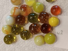 Vintage Cadmium Machine Made Glass Marbles Glow Orange With UV Light. Lot Of 21