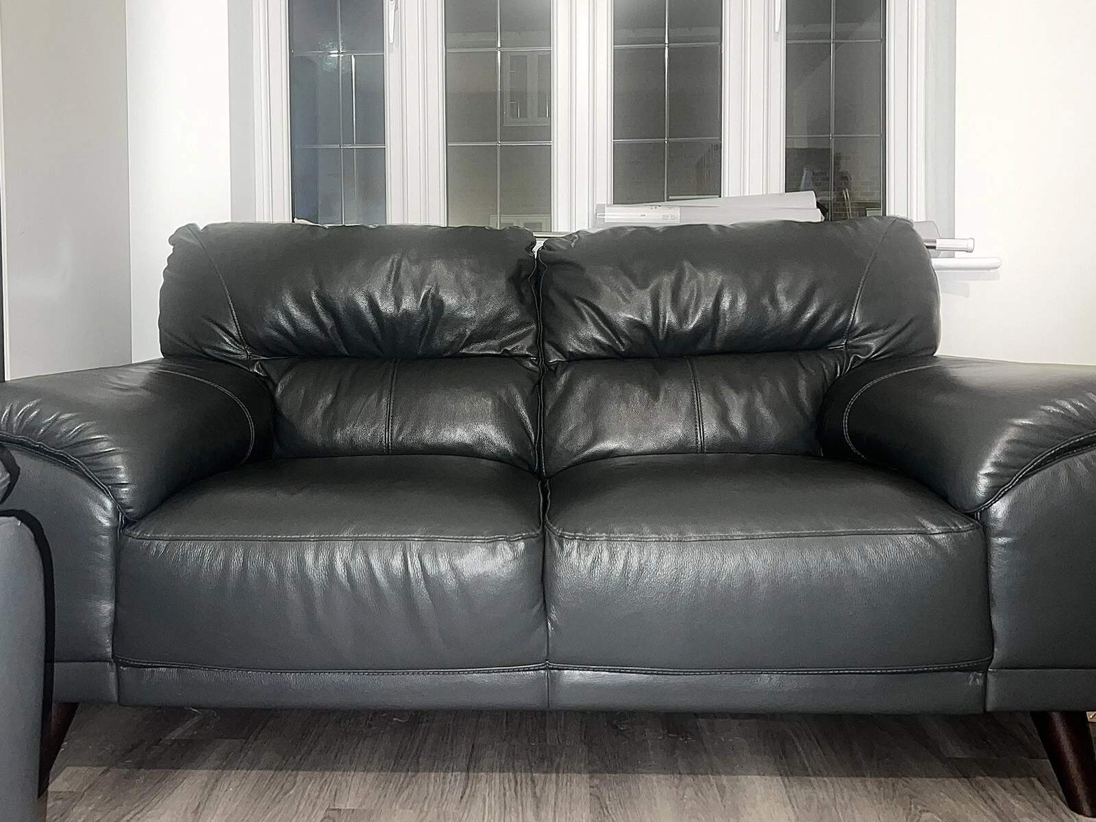 preloved 2 seaters sofa in black leather