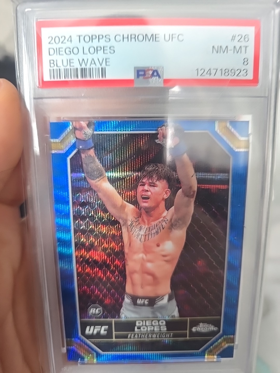 2024 Topps Chrome UFC - Diego Lopes #26 Blue Wave Refractor /75 (RC)
