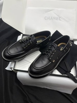 black leather boat shoes