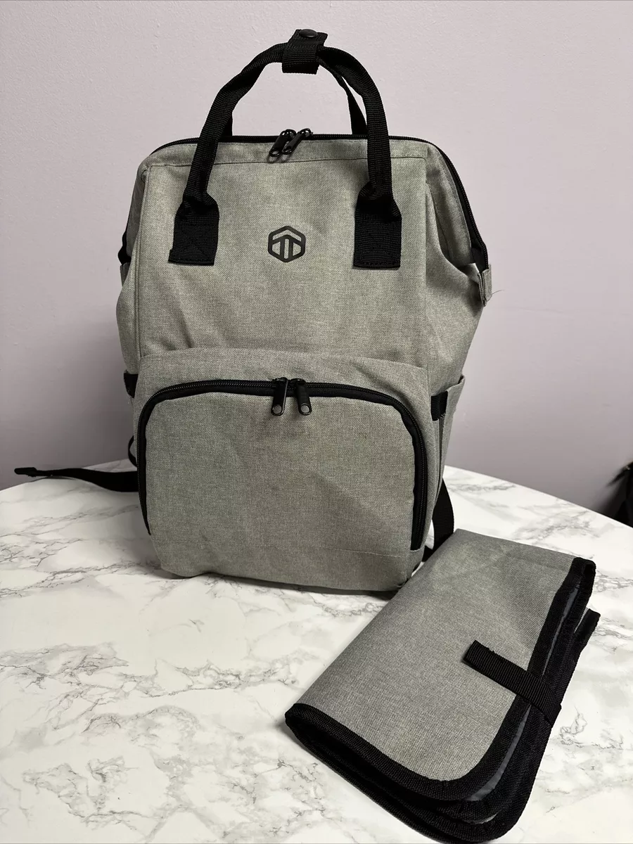 Baby changing backpack with changing mat top