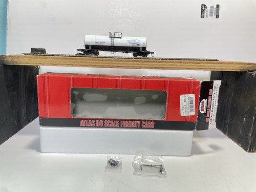 Tren a escala HO Atlas ACFX vagón cisterna caolín Freeport caolín #89936 #1710-1 con caja | Condition: Used