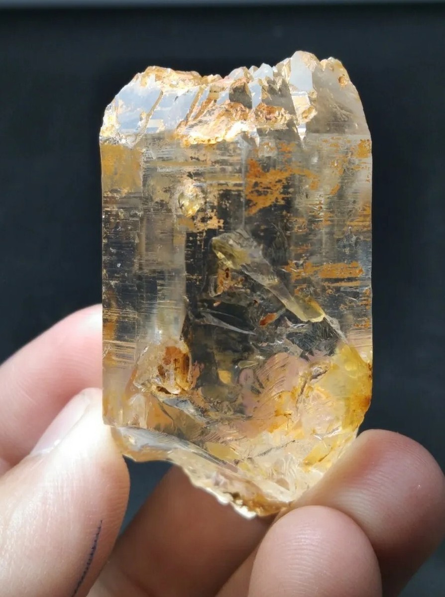 Transparent quartz with iron stain and interesting terminations on