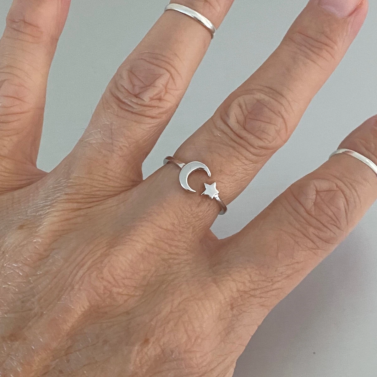 Ring with shop moon and star
