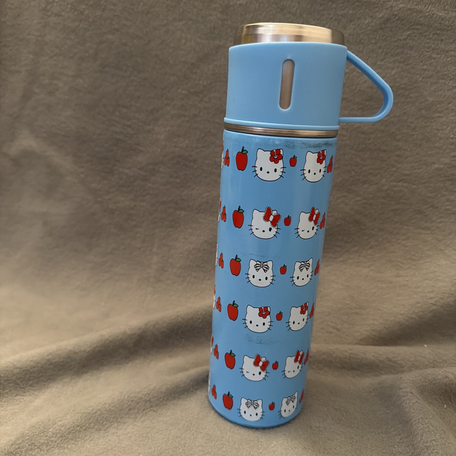 Sanrio Hello Kitty blue stainless steel water bottle with a cup lid 9.5&rdquo;