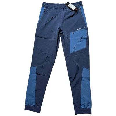 Pantalon de course tissé Monterrain Deflect junior en bleu marine BNWT taille... - Photo 1/4