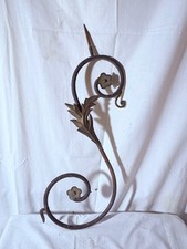 Antico candelabro da parete in ferro battuto