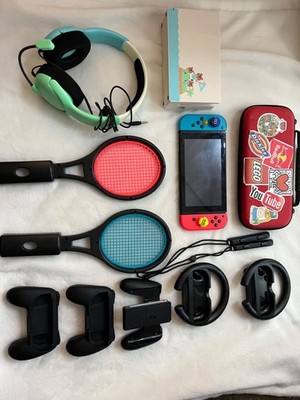 Nintendo Switch Handheld Console (With accessories)- Neon Red/Neon Blue