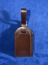 Authentic Louis Vuitton Large Brown W Gold Hardware leather name tag .