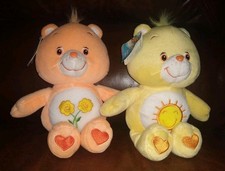 TWO CARE BEARS FRIEND FUNSHINE VINTAGE PLUSHES. YEAR: 2002. 8 INCHES TALL. NWT.