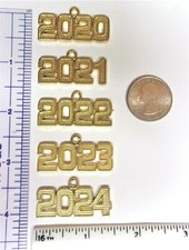 YOU GET 2 YOUR CHOICE OF 2024 2023 2021 2020 YEAR GRADUATION DATE NUMBER CHARMS