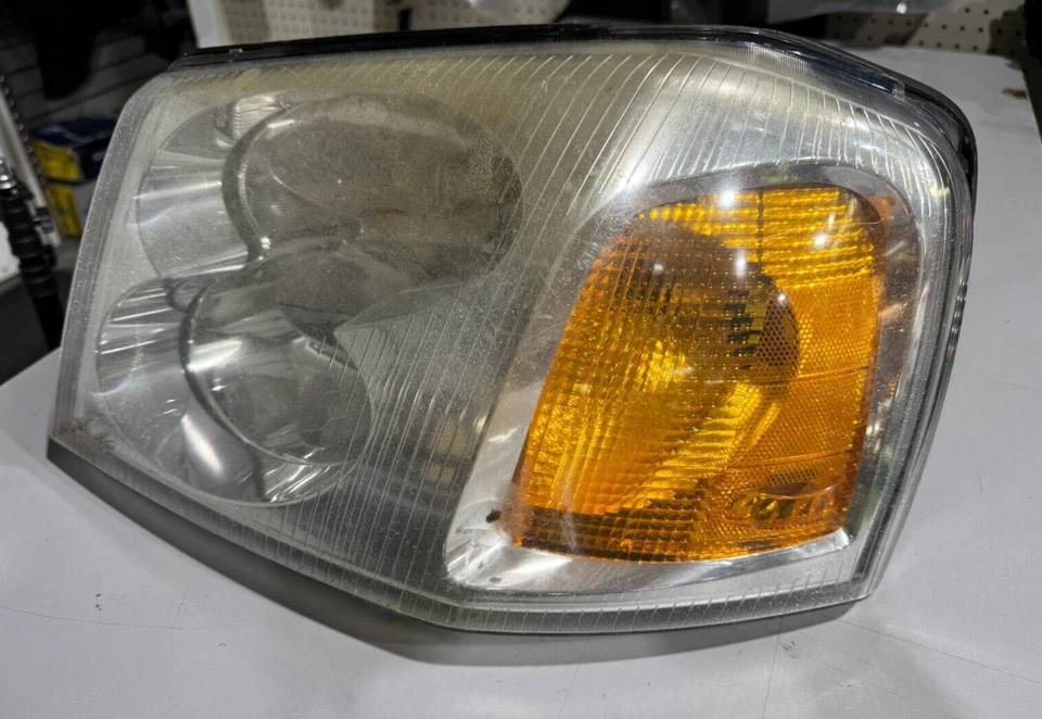 Faro delantero izquierdo GMC ENVOY 2002-2009 P/N 40310748 ORIGINAL OEM PIEZA USADA Foto 3 de 4