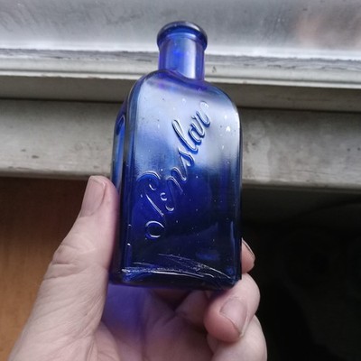 COBALT BLUE PENSLAR 100 YEAR OLD PANELED MEDICINE BOTTLE FROM DETROIT