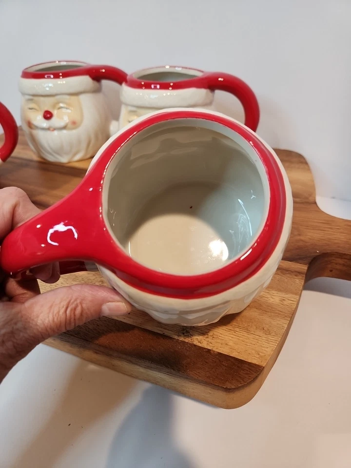 Boston Warehouse Trading Corp Juego de 4 tazas de Papá Noel ojos cerrados sonrientes 4x4 Foto 4 de 4