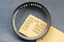 NIKKOR 24MM F2.8 FRONT LENS RING ONLY, NEW OLD STOCK REPAIR PART