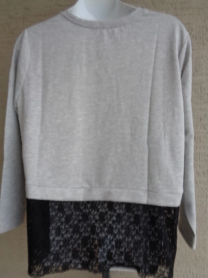 New Directions 3X Top L/S Terry Francés Alto Bajo Encaje Trasero Dobladillo Gris Precio de venta sugerido por el fabricante 48 USD. Foto 4 de 4