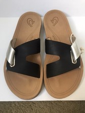 WOMEN'S OLUKAI NONOHE  OLU BLACK/GOLDEN SAND LEATHER UPPER FLIP FLOP SIZE 7 NWT