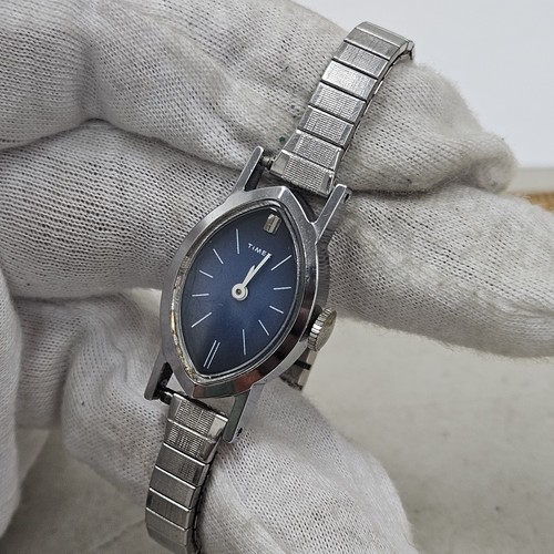 Unique Vintage Ladies Timex Oval Blue Dial Two Tone Stretch Band Mechanical Wind