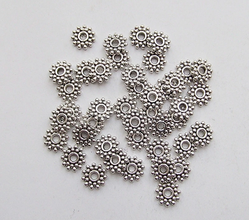 40pz perline metallo fiore spacer separatori 9mm colore argento tibet