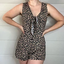 1990s lightweight black and pink floral rayon romper with buttons and tie.  