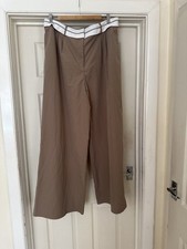 Pretty little thing brown trousers 14