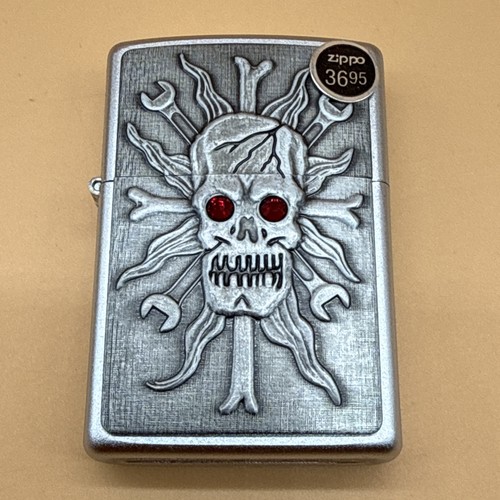 2007 Zippo Lighter Wrenching Headache Emblem Swarovski Crystal Eyes New READ!