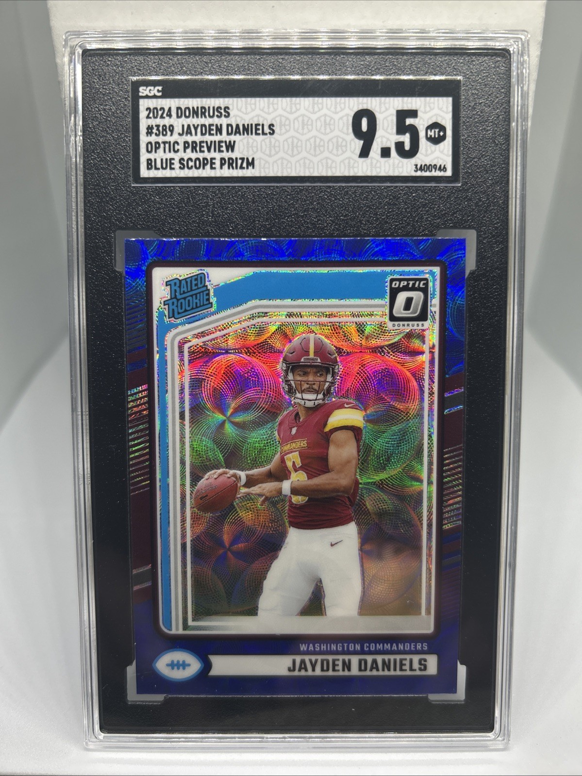 2024 PANINI DONRUSS OPTIC PREVIEW-BLUE SCOPE #389 JAYDEN DANIELS ROOKIE SGC 9.5