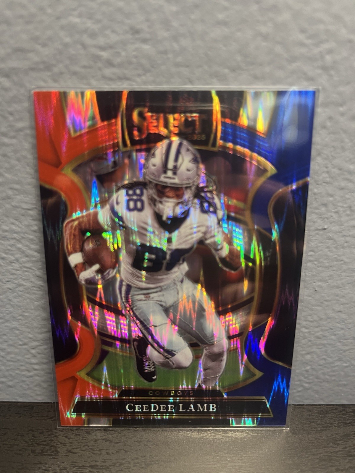 2025 Panini Select - Concourse CeeDee Lamb #98 Black & Orange Shock Prizm