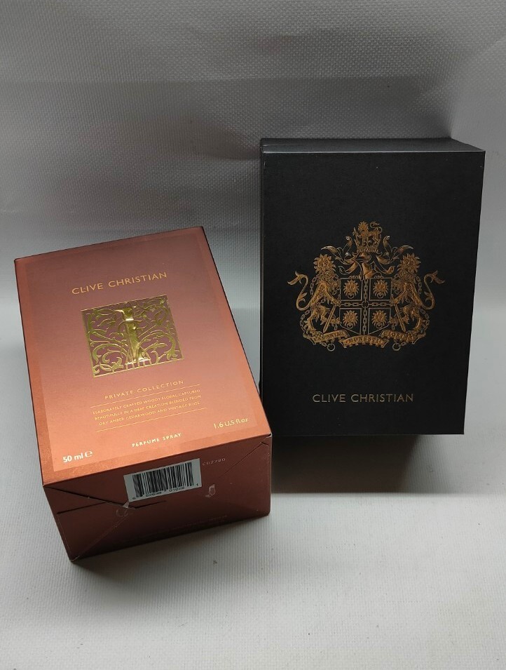 Empty Clive Christian perfume box with magnetic lid and booklet