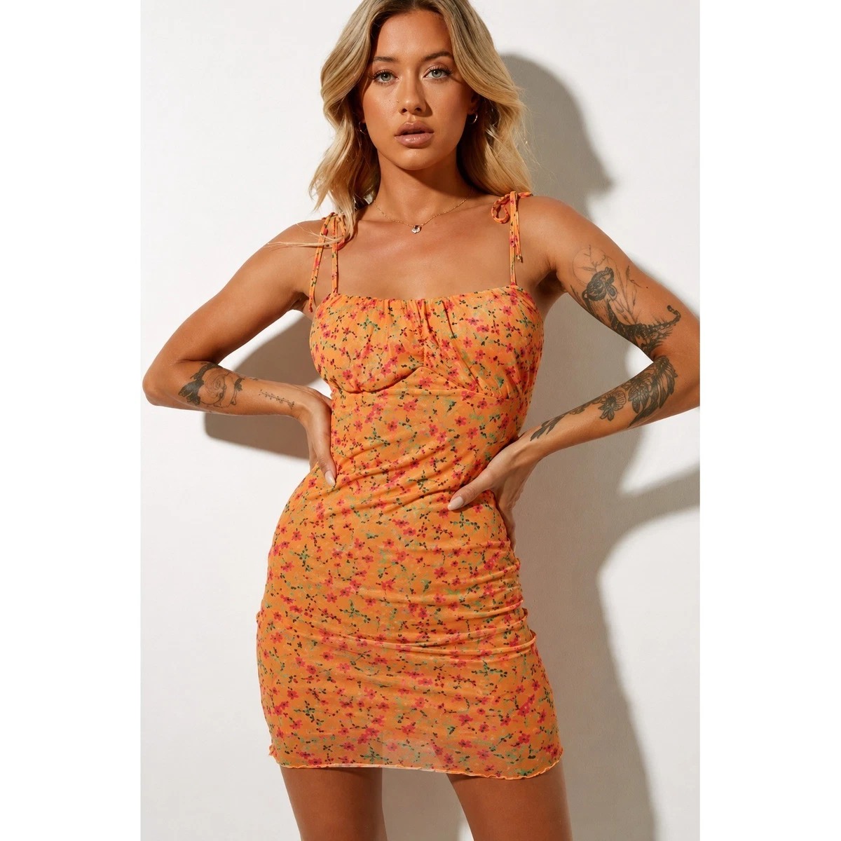motel rocks dresses Mini it features a slim fit that falls midi length with a plunge V neckline and thick straps Motel Floral Dresses for Women