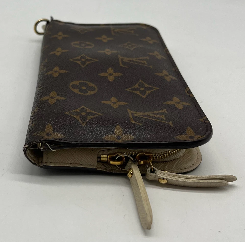 Cartera sobre Louis Vuitton marrón con estampado de monograma de cuero insolite Foto 3 de 4