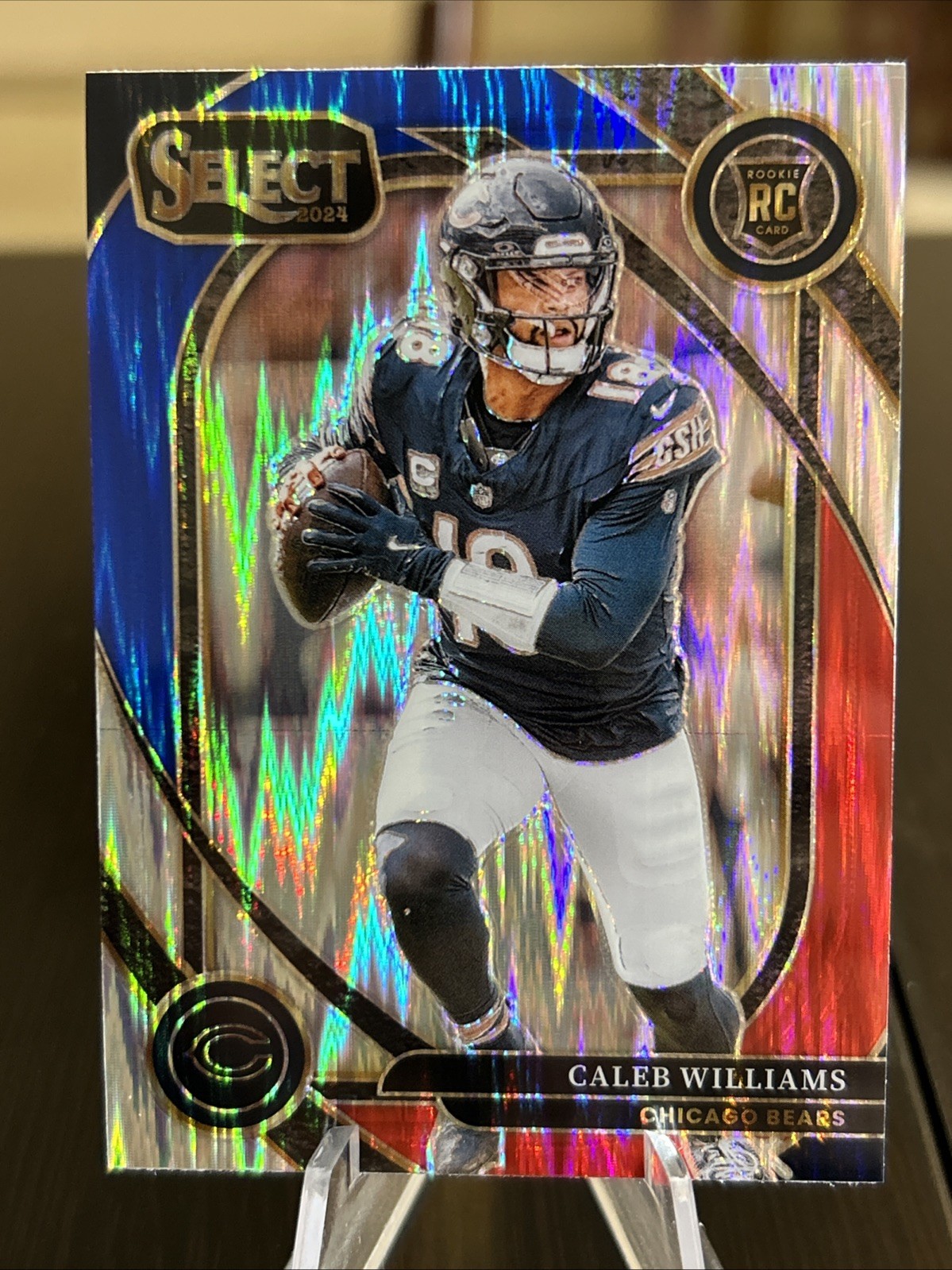 2024 Select Prizm Red and Blue Shock #216 Caleb Williams RC