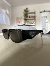 Prada Triangle logo sunglasses with original packaging and case
