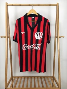 red and black striped soccer jersey
