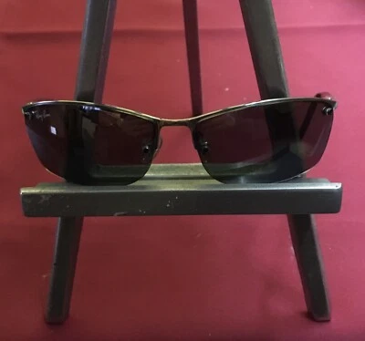 Paire de Lunettes de soleil Ray Ban enfant (8/12ans environ), avec son étui noir - Photo 1/4