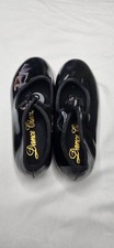 Black patent tap shoes