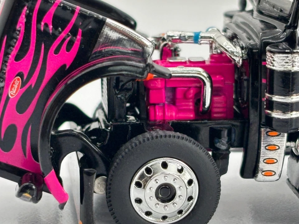 1/64 DCP BLACK/PINK PETERBILT 389 W/ 63" MID ROOF SLEEPER W/ WHALE TAIL - Image 3 of 4