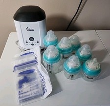 Tommee Tippee Bundle Set. Warmer, Bottles, Bags. Sells New For ABOUT 60