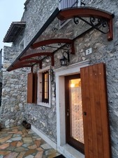 pensilina tettoia in legno lamellare pensiline tenda policarbonato LEGNO RICCIO