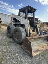 Bobcat 980 Skid Steer Loader Wheeled Mount with Front Bucket Attachment
