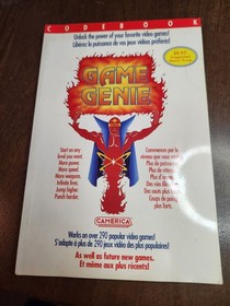 nes game genie with book broken tab