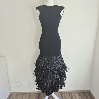 aje black raffia dress Shop Aje's Agave Knit Raffia Midi Skirt In Black main image 0