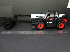 BOBCAT telescopic handler with man platform - Construction Warehouse