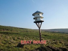 FOTO PALOMAR COSECHAS INFERIORES GRANJA BACUP UNA CASA LIGERAMENTE FUERA DE PLOMADA PARA EL COMERCIO