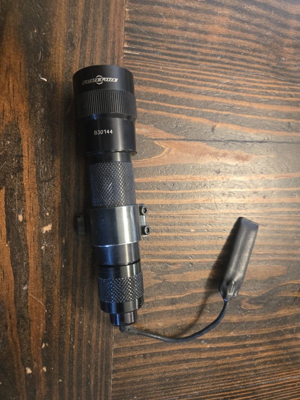 Surefire 660 Weapon Mounted Flashlight With Pressure Pad and Weaver mount