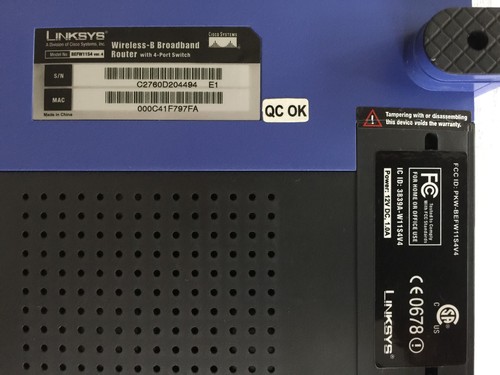 RCA DCM425 Cable Modem and Linksys BEFW11S4 Wireless-B Router with adapters - Picture 10 of 11