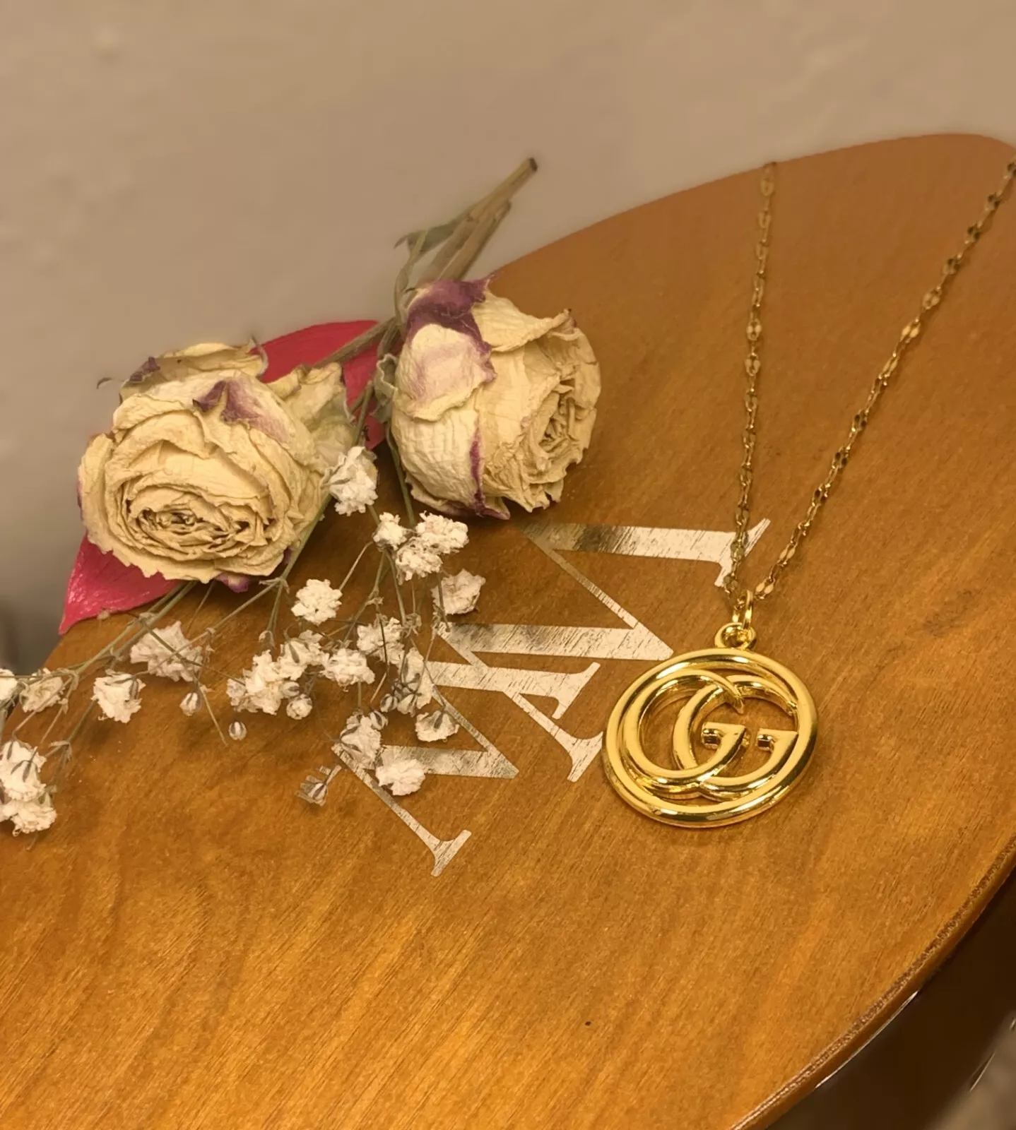 Collier ras du cou à bascule chaîne boule double G à emboîtement doré Gucci GG