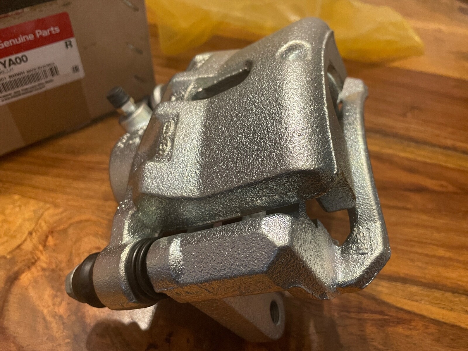 Kia Picanto 1117 NEW GENUINE LH front brake caliper & carrier