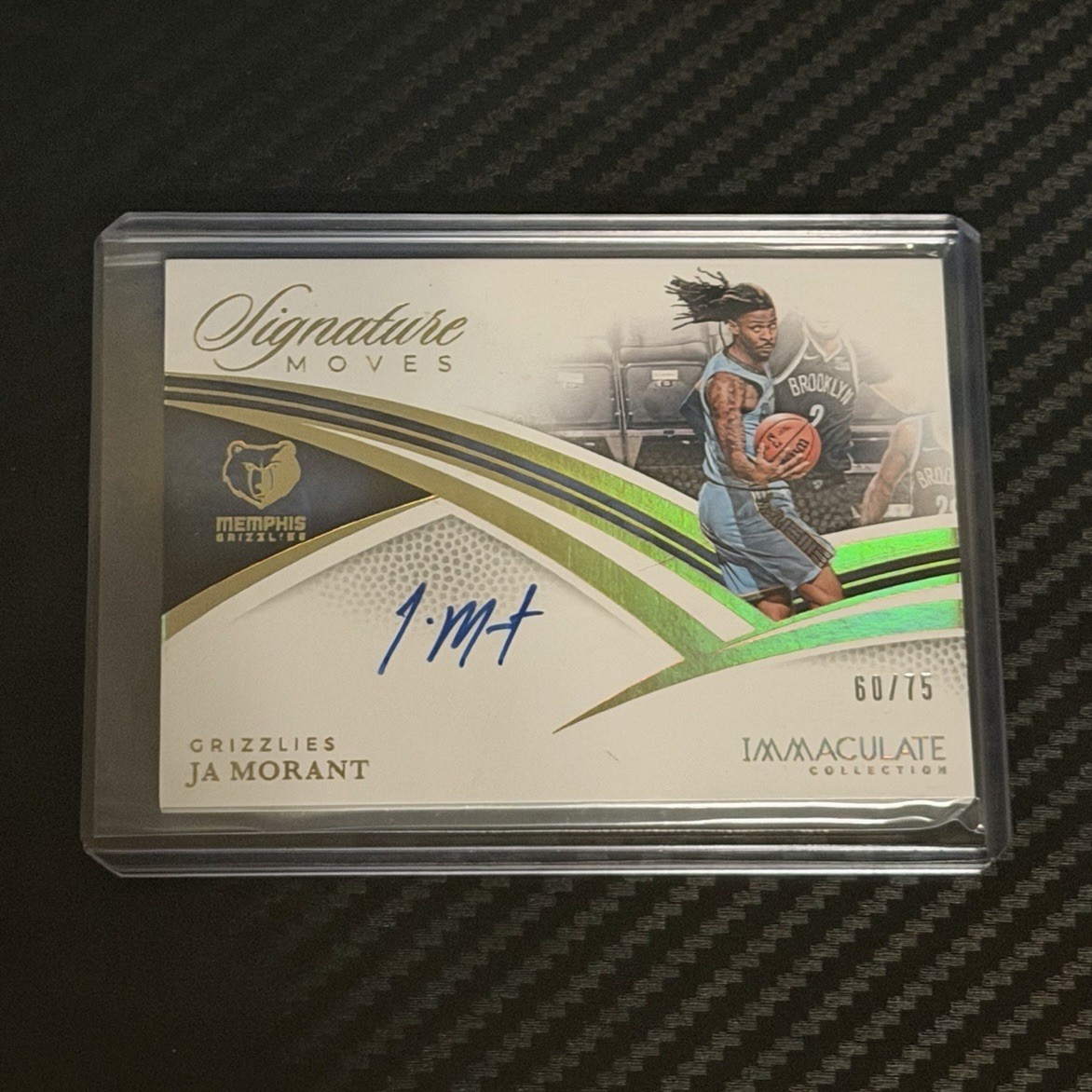 Ja Morant #10 Basketball Cards 2024 Panini Immaculate Signature Moves trading card — raw and PSA graded price guide